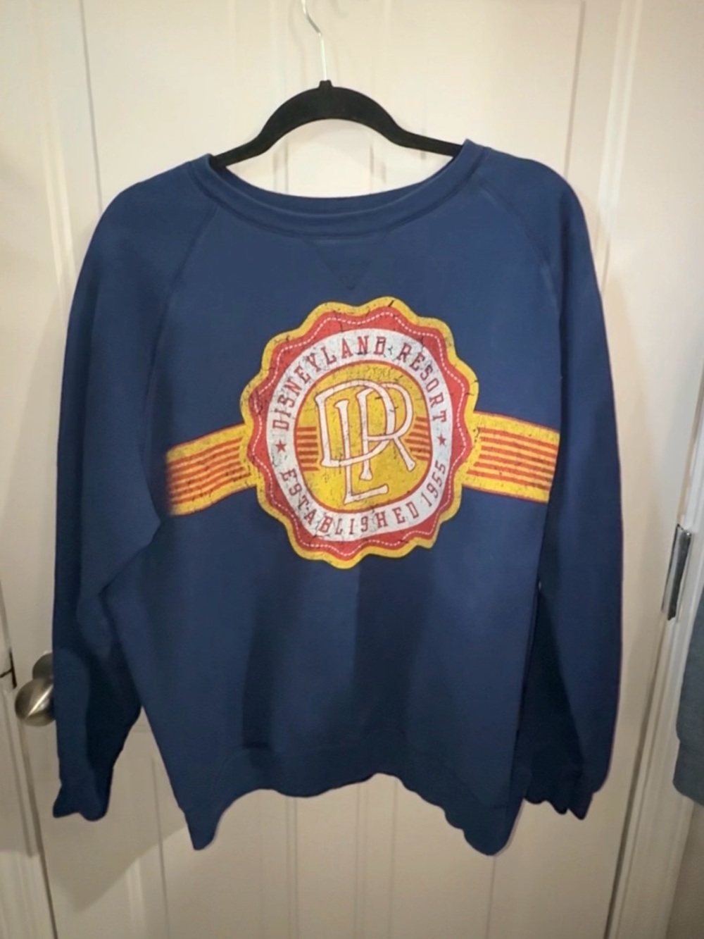 Blue Disneyland Graphic Crewneck Sweatshirt with Yellow Emblem